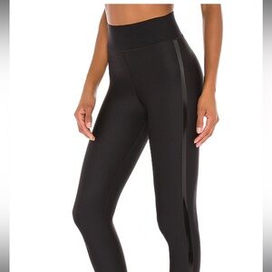 84% nylon, 16% lycra Lining: 65% nylon, 35% lycra Built-in shapewear